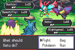 Xatu and Mightyena in a Double Battle against Dustox and Beautifly